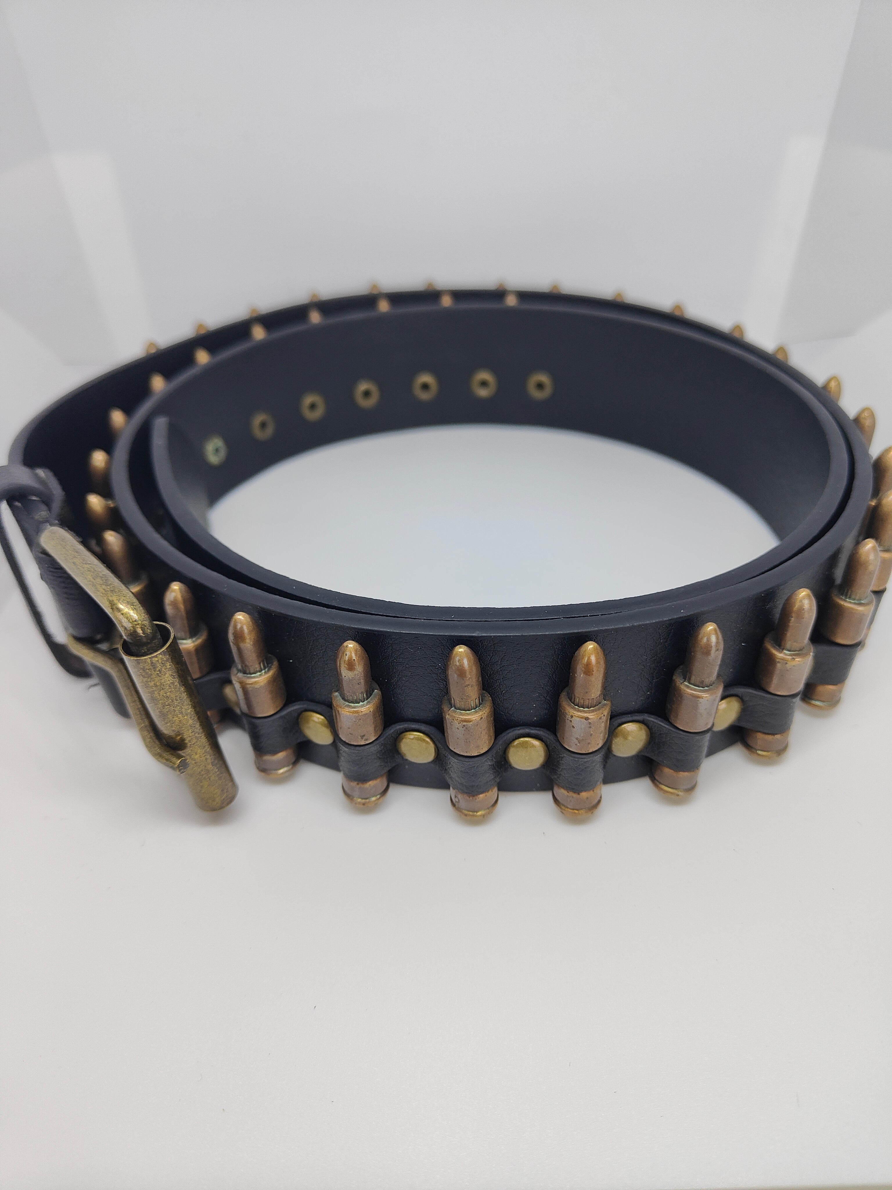 Ceinture noire à balles couleur bronze